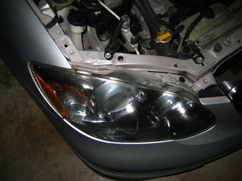 how to replace headlight bulb 2003 toyota corolla #1