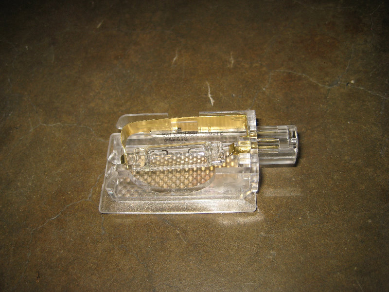 Chrysler-300-Door-Courtesy-Step-Light-Bulb-Replacement-Guide-004