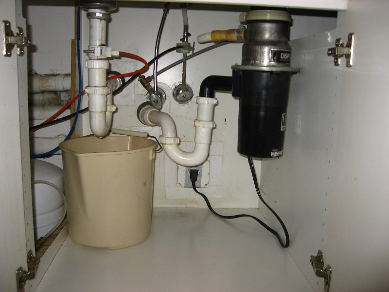 fix kitchen sink trap leak