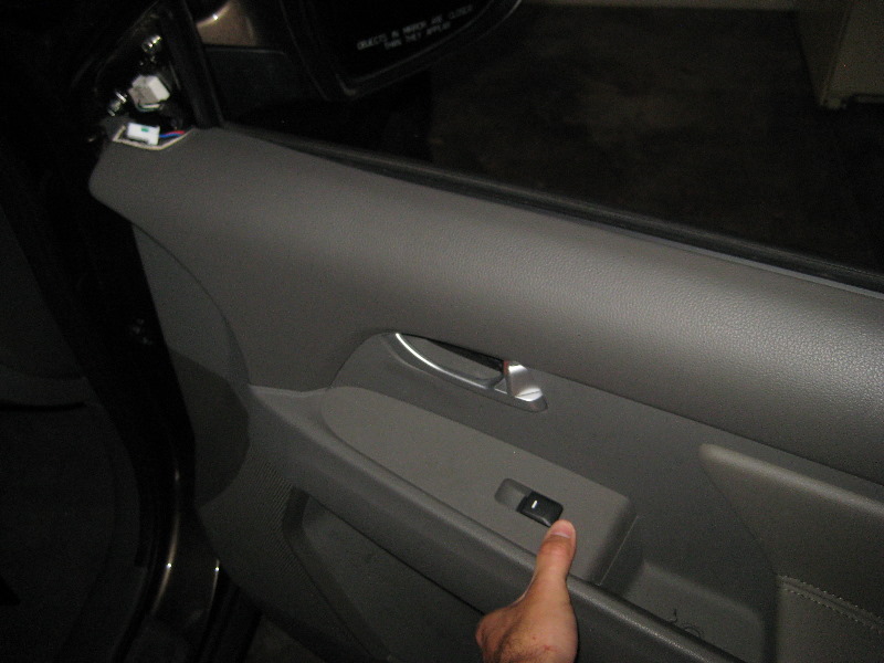 Kia-Sportage-Interior-Door-Panel-Removal-Guide-037